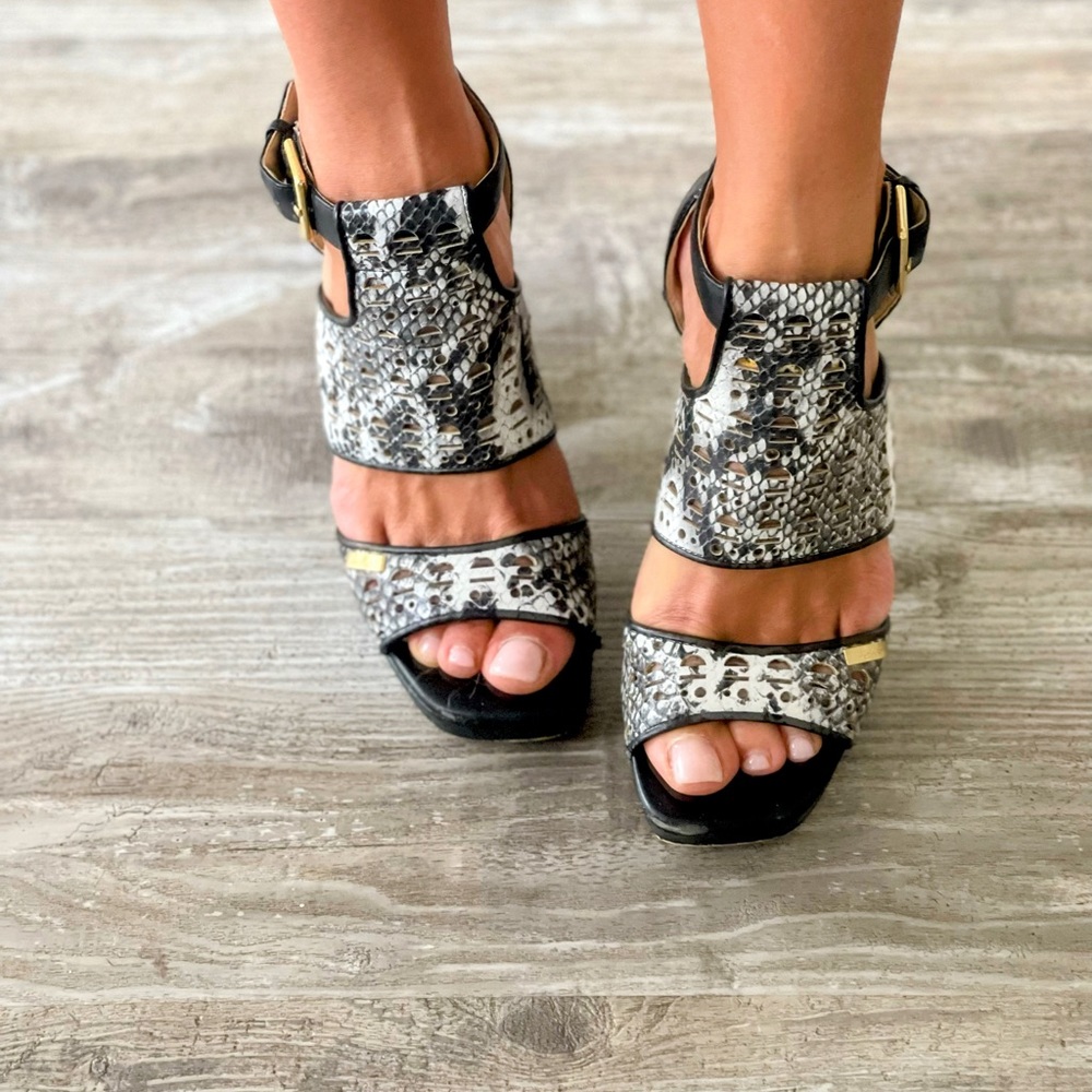 Calvin Klein sandals, very comfortable, not hard to walk, medium heel size!